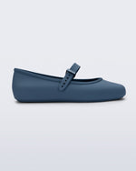 Side view of a blue Soft Ballerina flat with top buckle strap