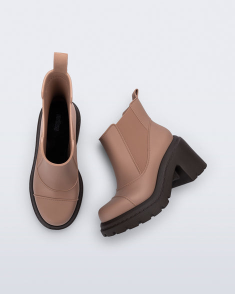 Top and side view of a pair of brown Courtney boots with dark sole.