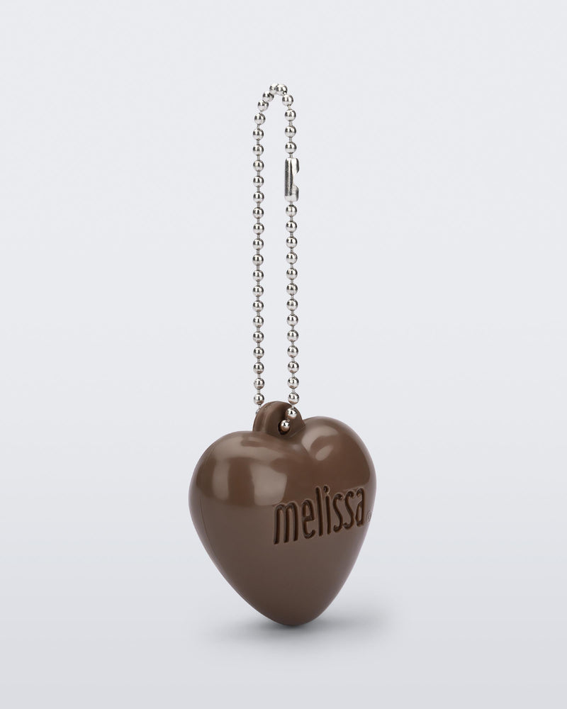 Angled view of a brown Heart Charm