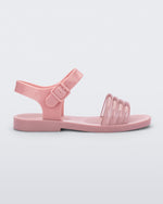 Side view of a pink Mar Wave kids sandal.