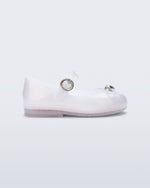 Side view of a pearly clear baby Sweet Love flat