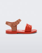 Side view of a red Mar Wave baby sandal with beige strap.