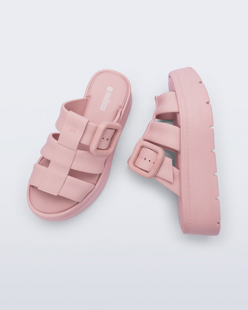 Top and side view of a pair of pink Pump Platform sandals