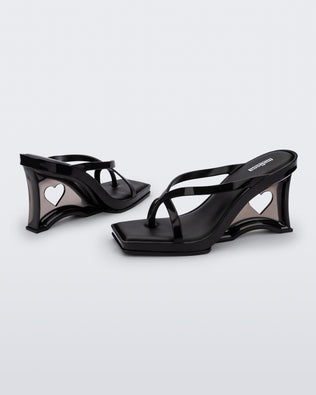 Product element, title Glass Heel in Black
 price $83.30