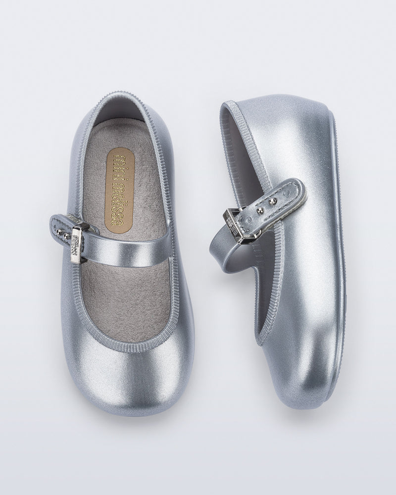 Top and side view of a pair of silver Soft Ballerina baby flats