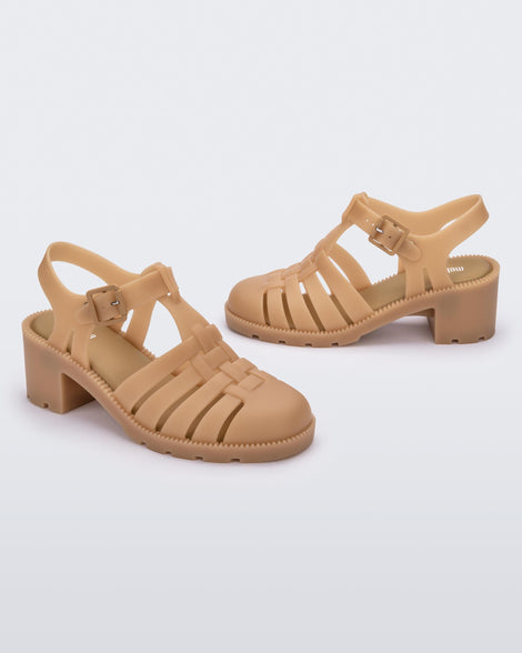 Angled view of a pair of beige Possession Heel women's fisherman style sandals.