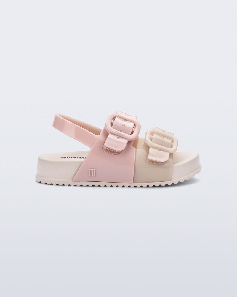 Side view of a pink/beige Cozy baby slide with two buckles