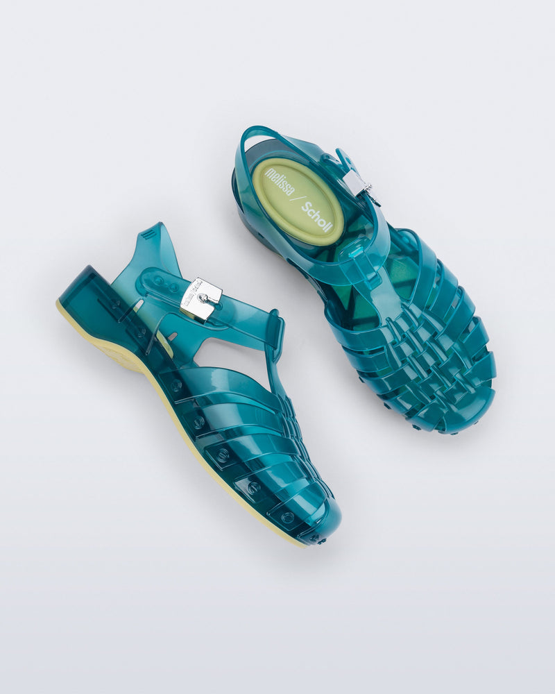 Side and top view of a pair of blue Possession Pescura + Scholl fisherman sandals