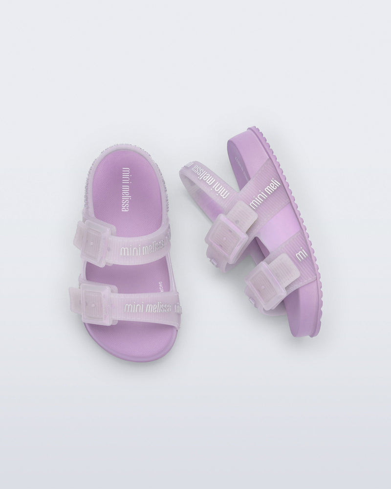 Top and side view of a pair of lilac Cozy M Lover baby sandals