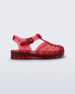 Side view of a clear red Possession baby sandal