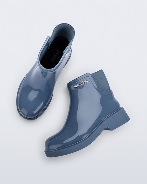 Top and side view of a pair of blue Chelsea II kids boots