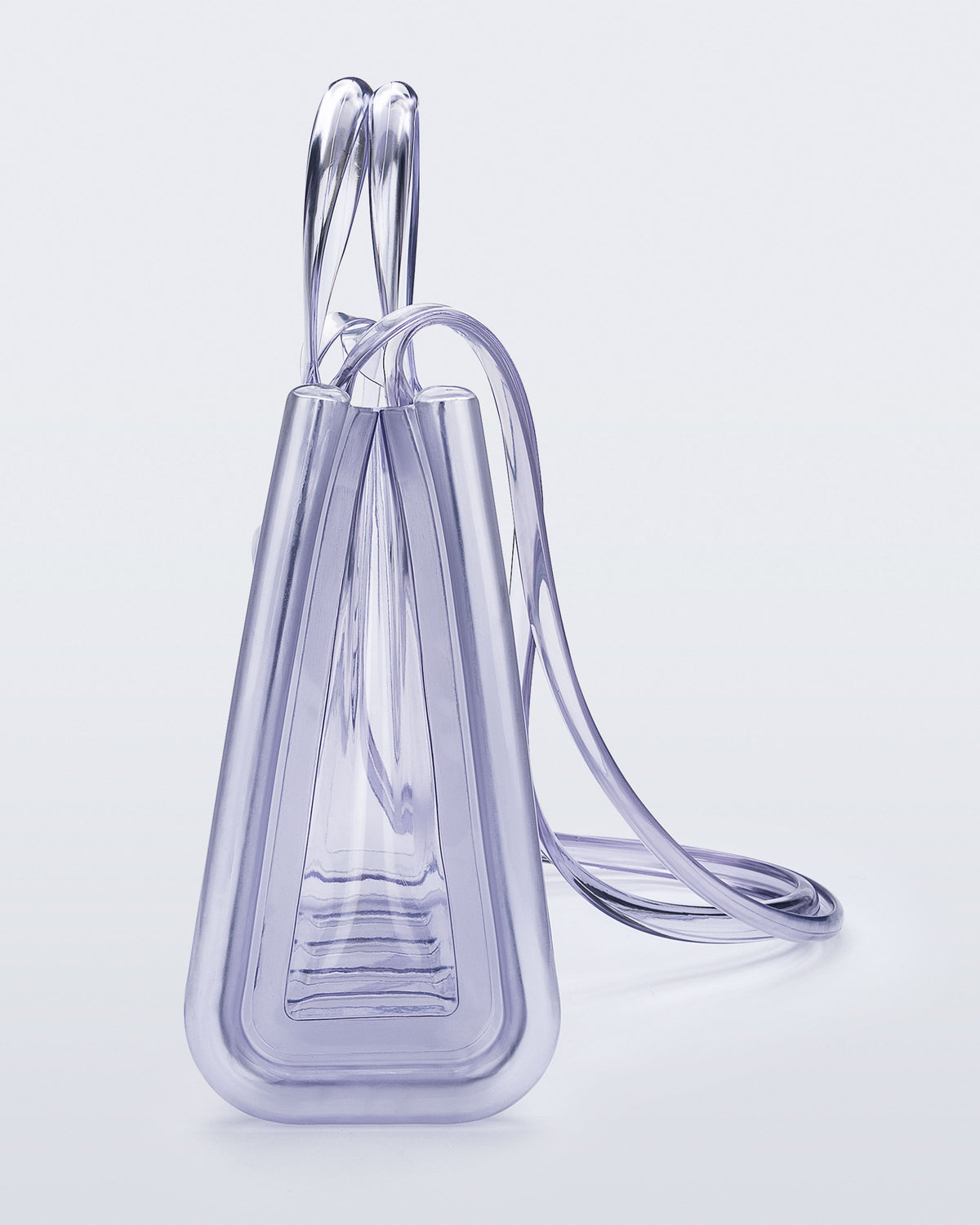 Side view of the clear Medium Jelly Shopper x Telfar bag