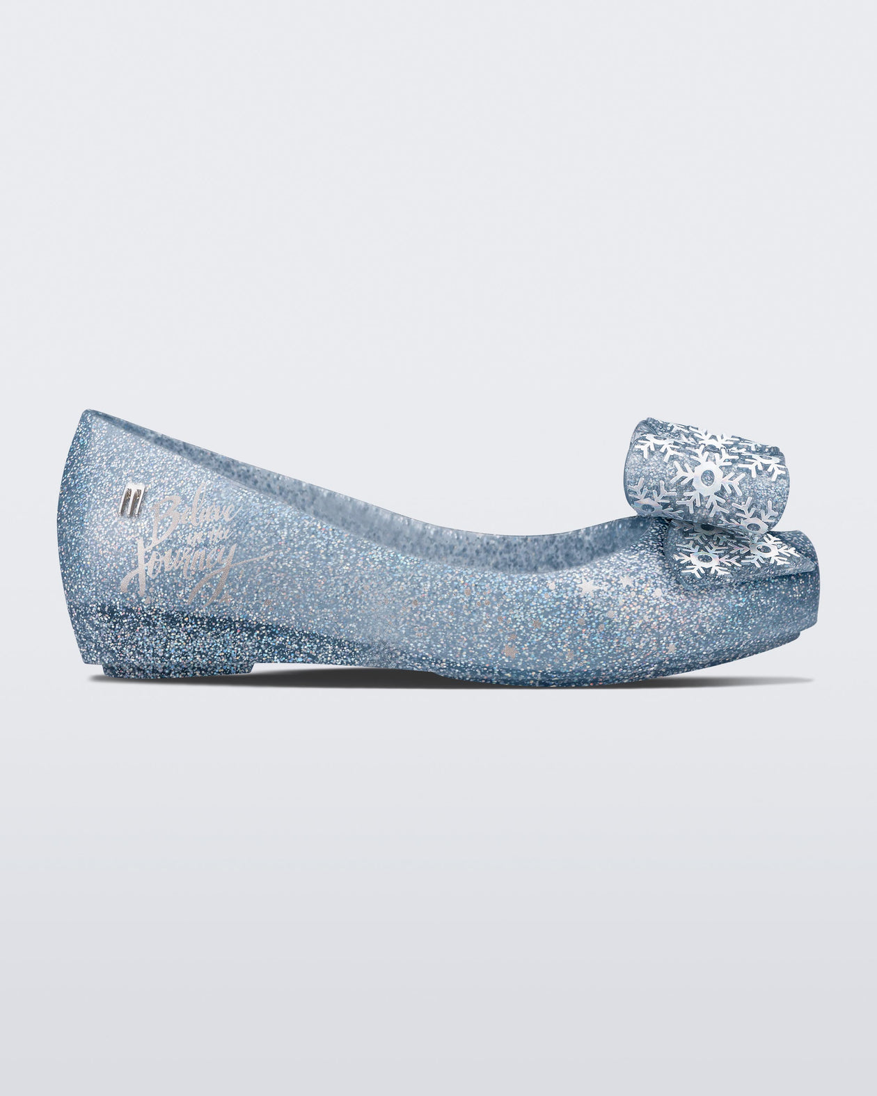 Side view of a blue/glitter kids Ultragirl Frozen flat.