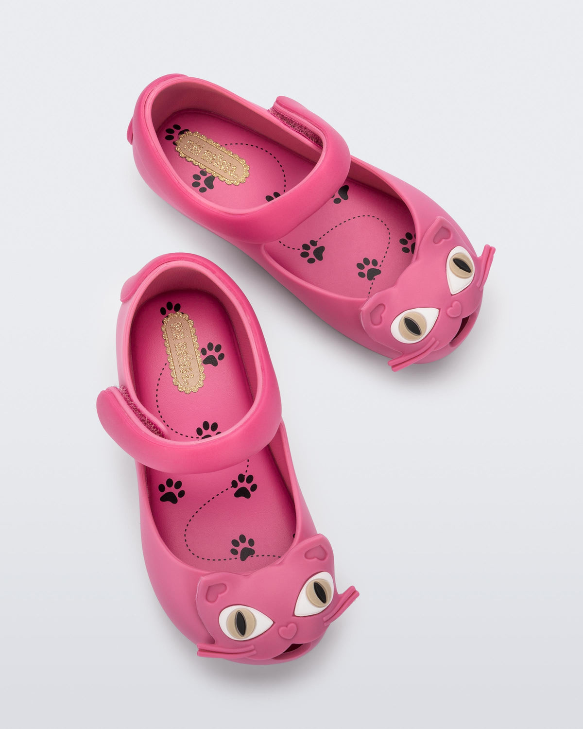 Top view of a pair of pink Ultragirl Cat baby flats