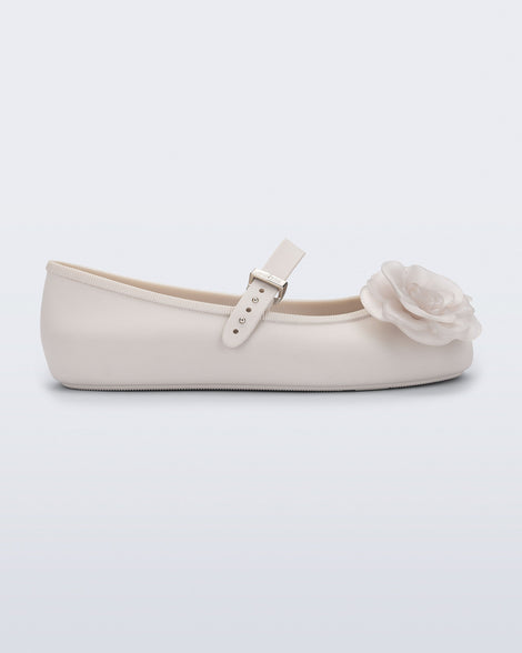 Side view of a beige Soft Ballerina Petals flat