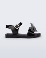 Side view of a glitter black Mar Sweet kids sandal