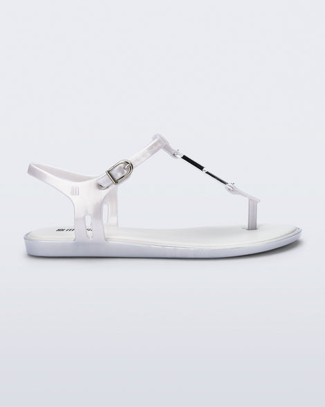 Side view of a pearly white Solar M Chic sandal
