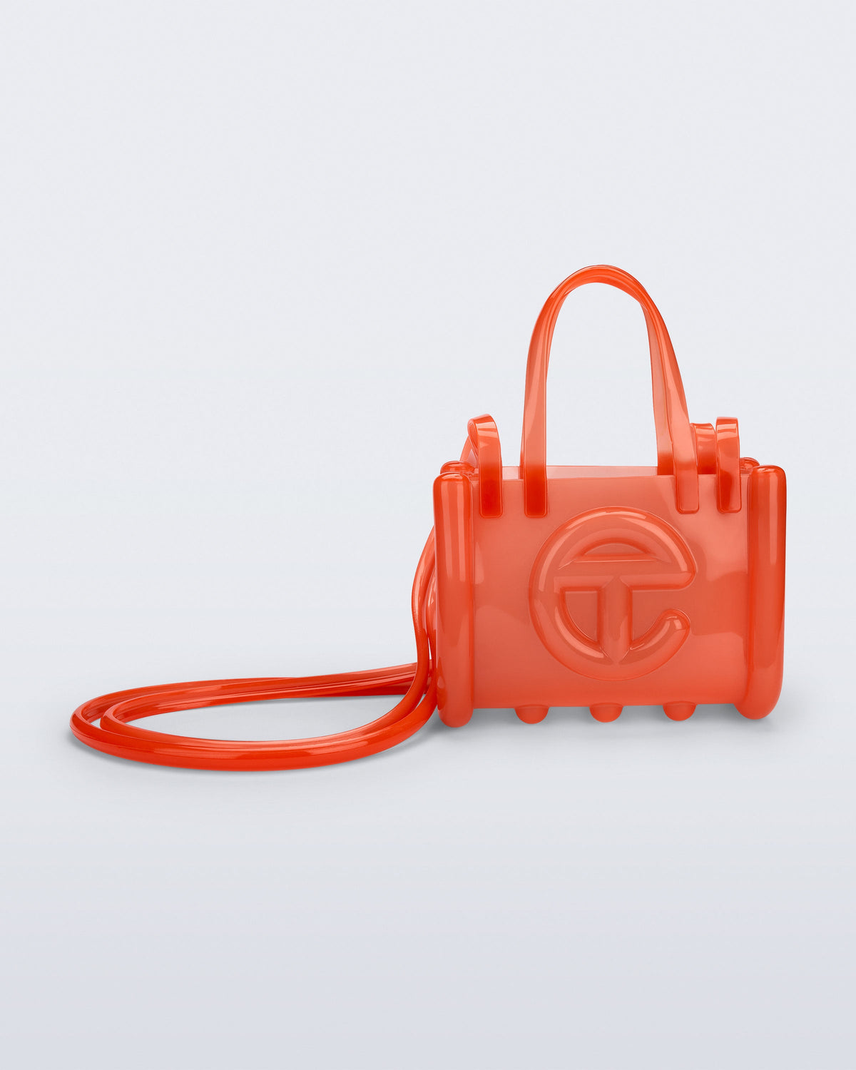 Front view of the orange Small Jelly Shopper x Telfar bag