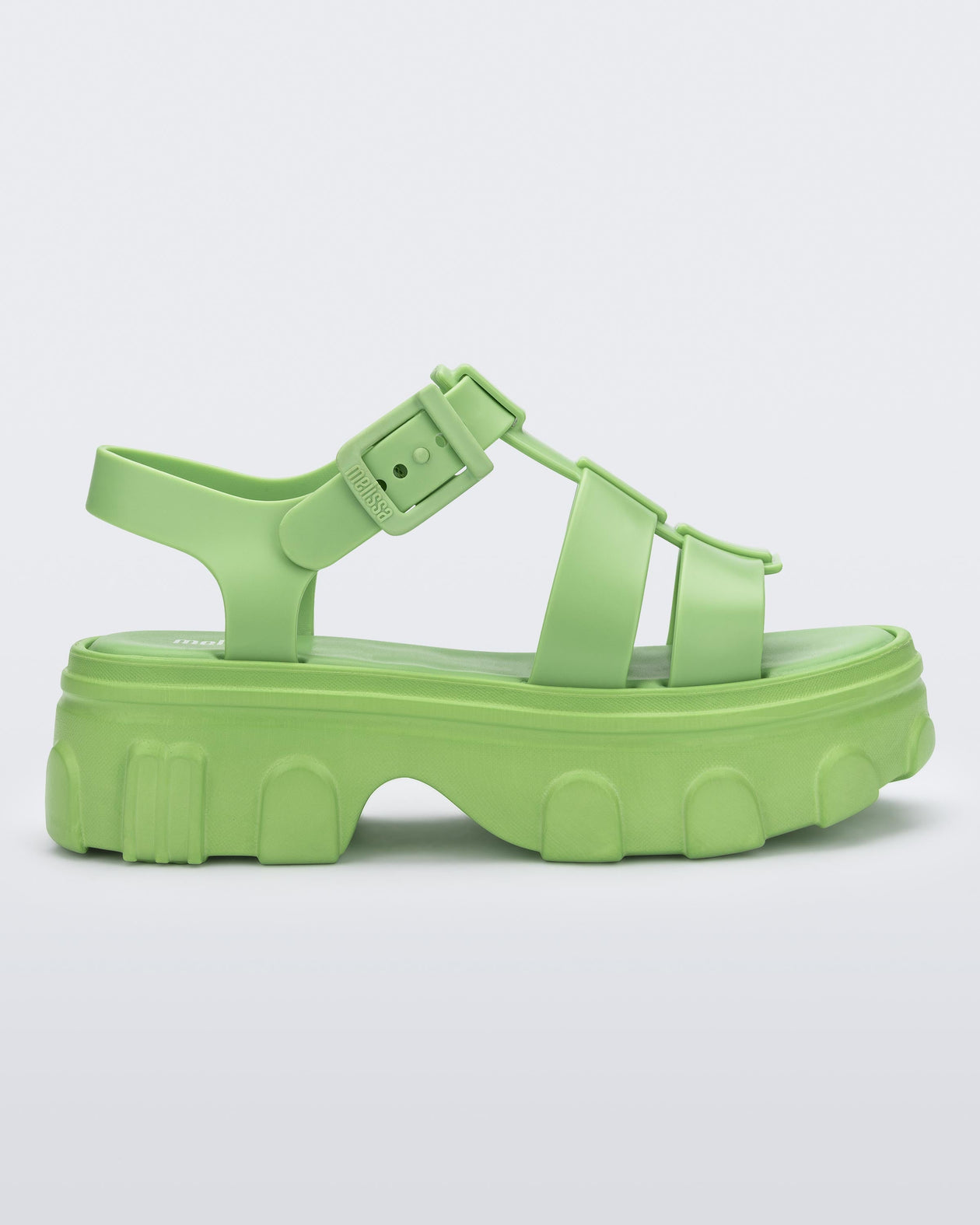 Side view of a green Ella women's platform sandal.