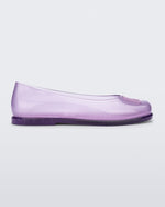 Side view of a lilac Ruby + Marc Jacobs flat