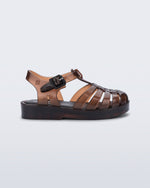 Side view of a clear brown Possession baby sandal