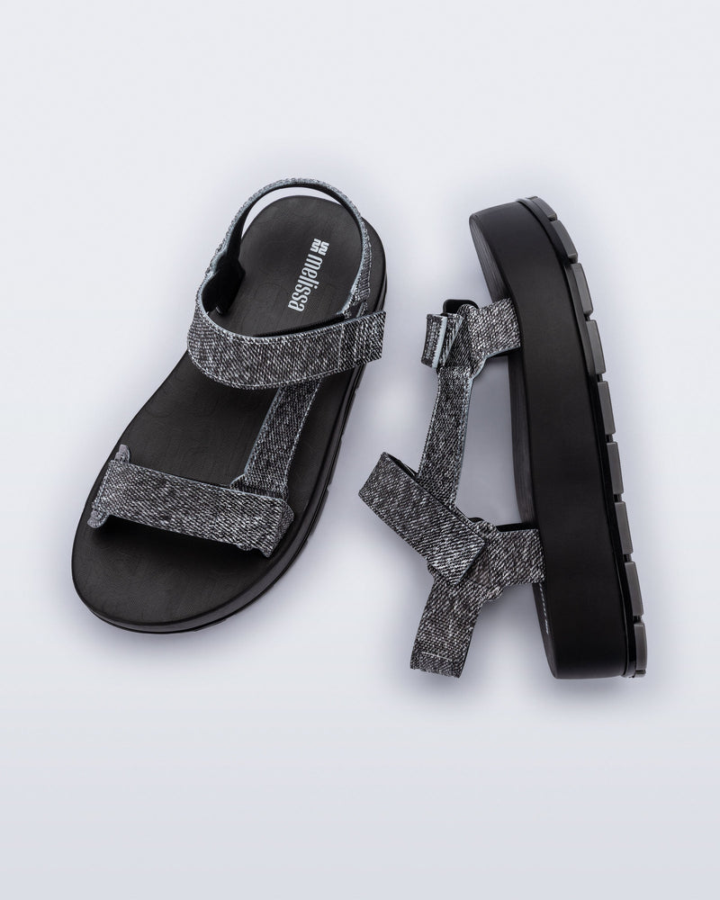 Top and side view of a pair of black jean Flowing Denim platforms