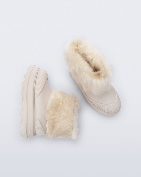 Top and side view of a pair of beige Warm Boot with fuzzy cuff and insole