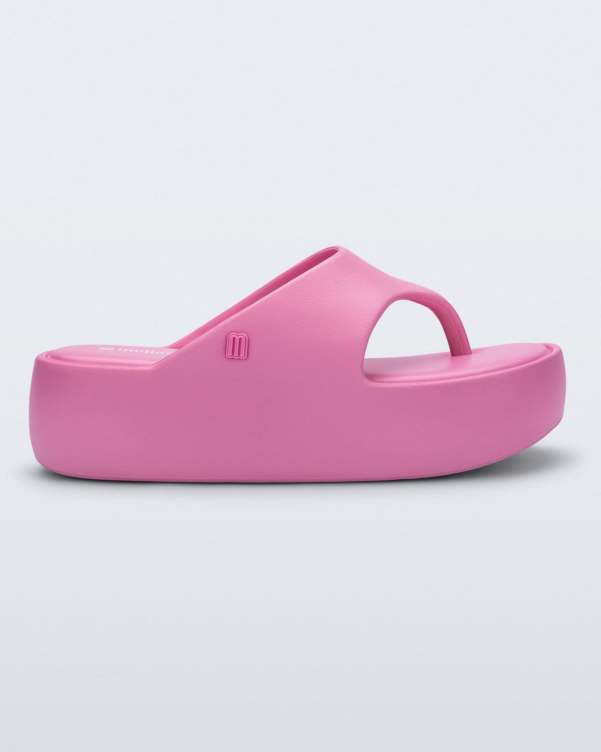 Side view of a pink Free Platform Thong sandal