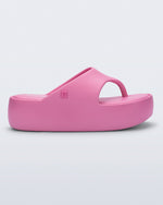 Side view of a pink Free Platform Thong sandal