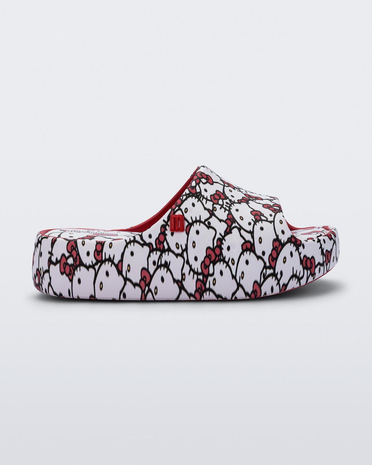 Side view of a red Free Platform slides + Hello Kitty and Friends kids sandals with Hello Kitty print