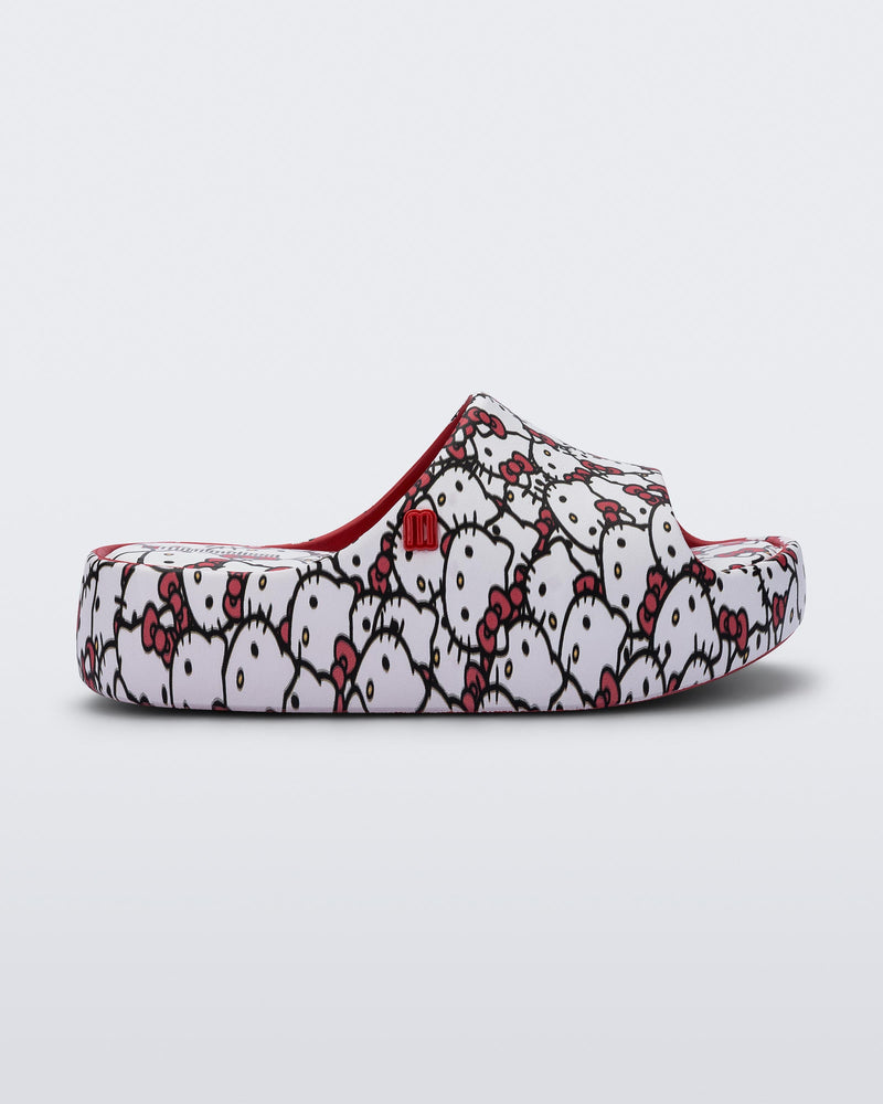 Side view of a red Free Platform slides + Hello Kitty and Friends kids sandals with Hello Kitty print