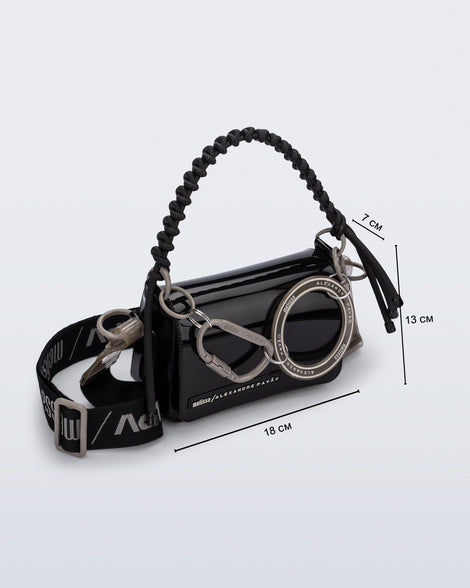 Angled view of an black Olga Bag + Alexandre Pavao with short strap fabric long strap. With purse dimensions of 18cm x 7cm x 13cm