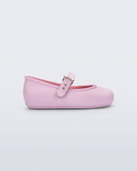 Side view of a pink Soft Ballerina baby flat with Velcro strap