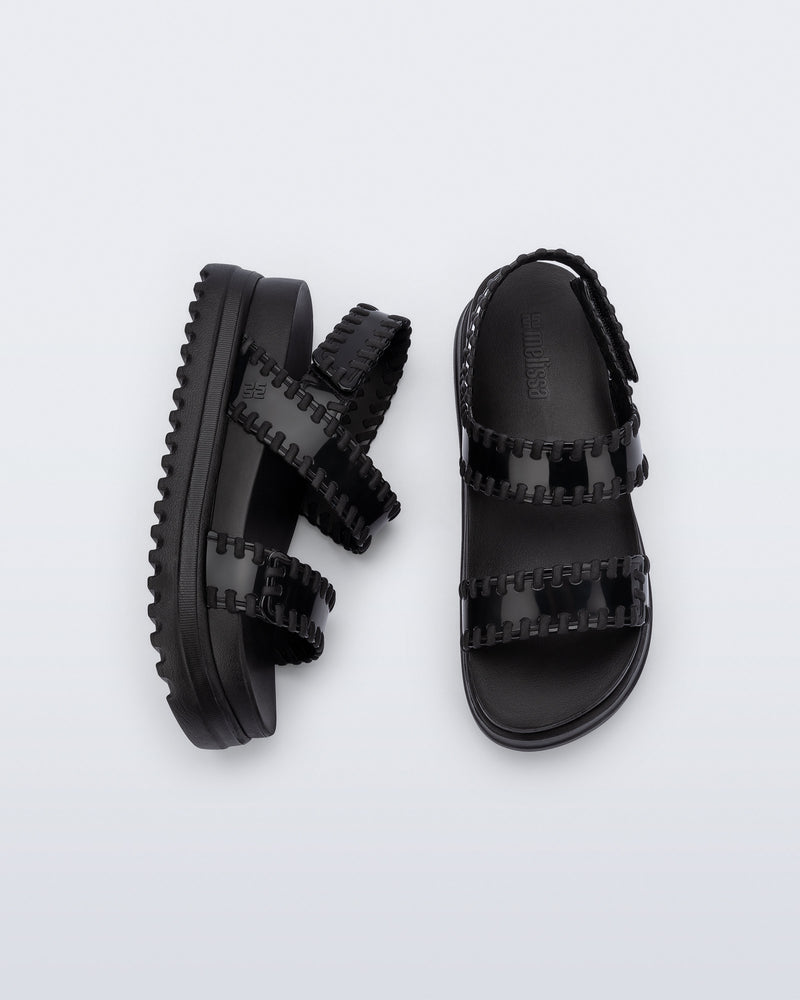 Top and side view of a pair of black Dune Platform Sandals with faux stitching on the straps
