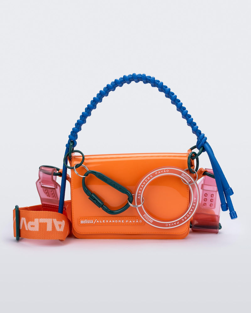 Front view of an orange Olga Bag + Alexandre Pavao with blue short strap fabric long strap