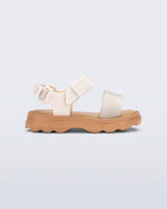 Side view of a beige/glitter Kick Off baby sandal