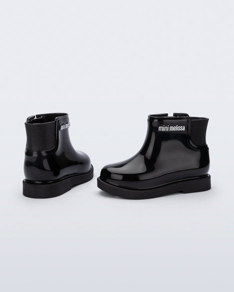 Back and side view of a pair of black Chelsea II baby boots