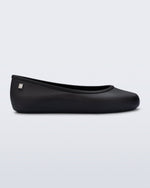 Side view of a black Soft Ballerina Essential Flat