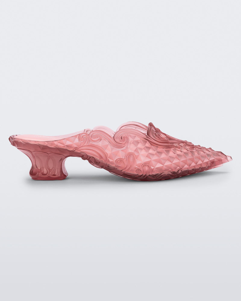 Side view of a pink Court Shoe + Y/Project mule kid heel