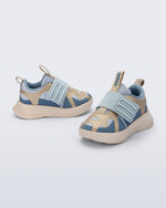 Side and angled view of a pair of blue X Beat baby sneakers with beige trim