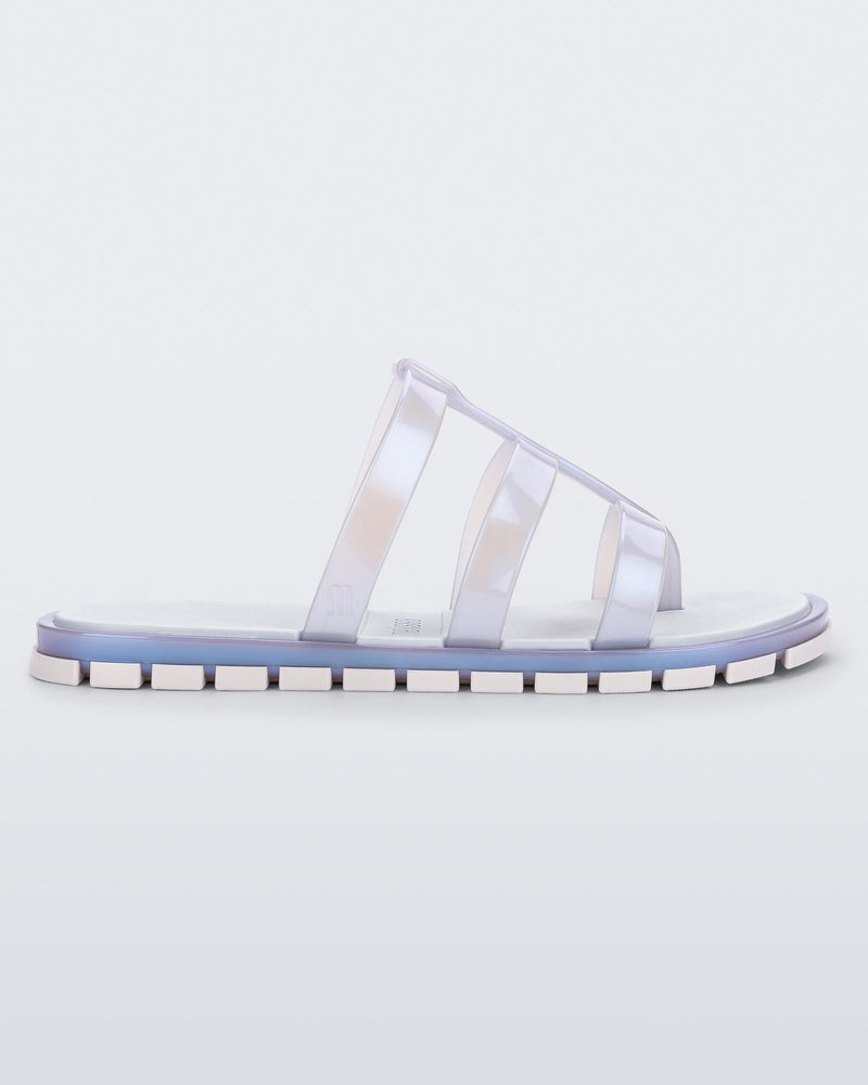 Side view of a pearly blue Path adult sandal with blue sole