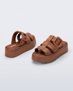 Back and angled view of a pair of brown Pump Platform sandals