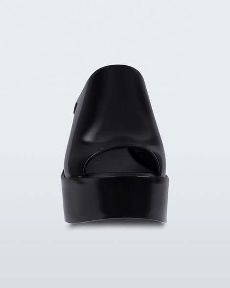 Front view of a black Melissa Mules platform heel.