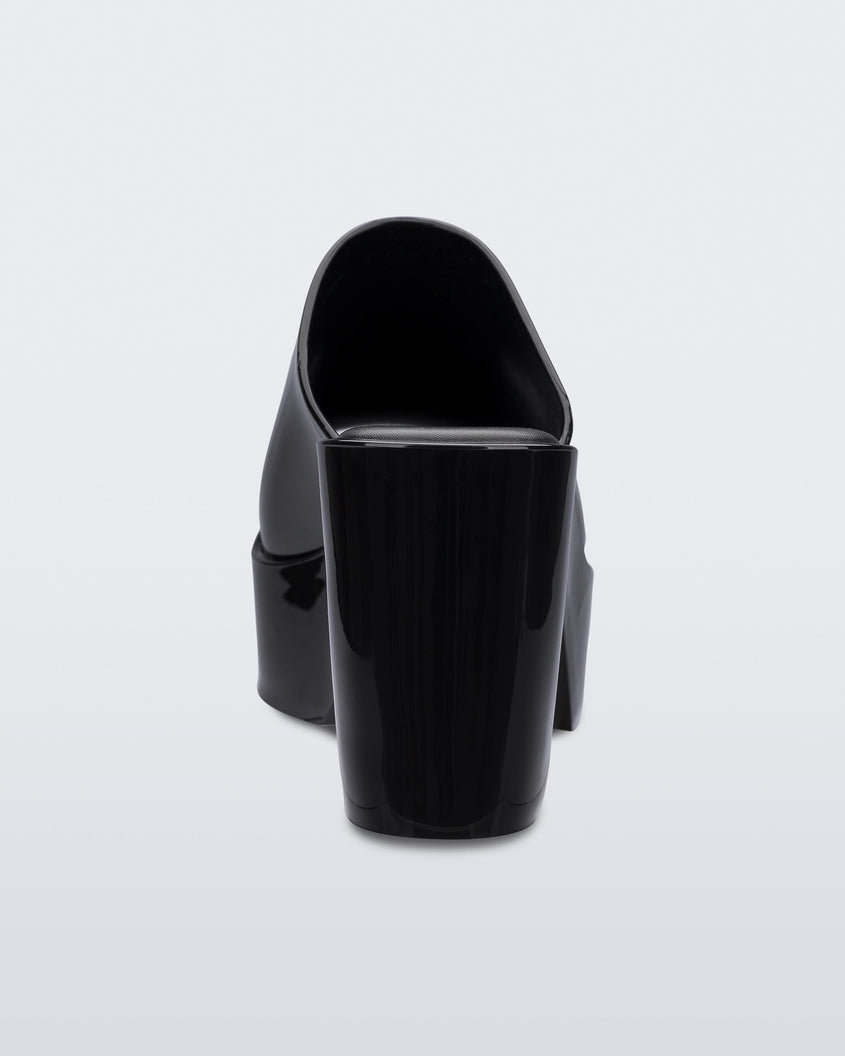 Back view of a black Melissa Mule platform heel.