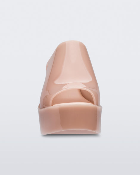 Front view of a pink Melissa Mules platform heel.