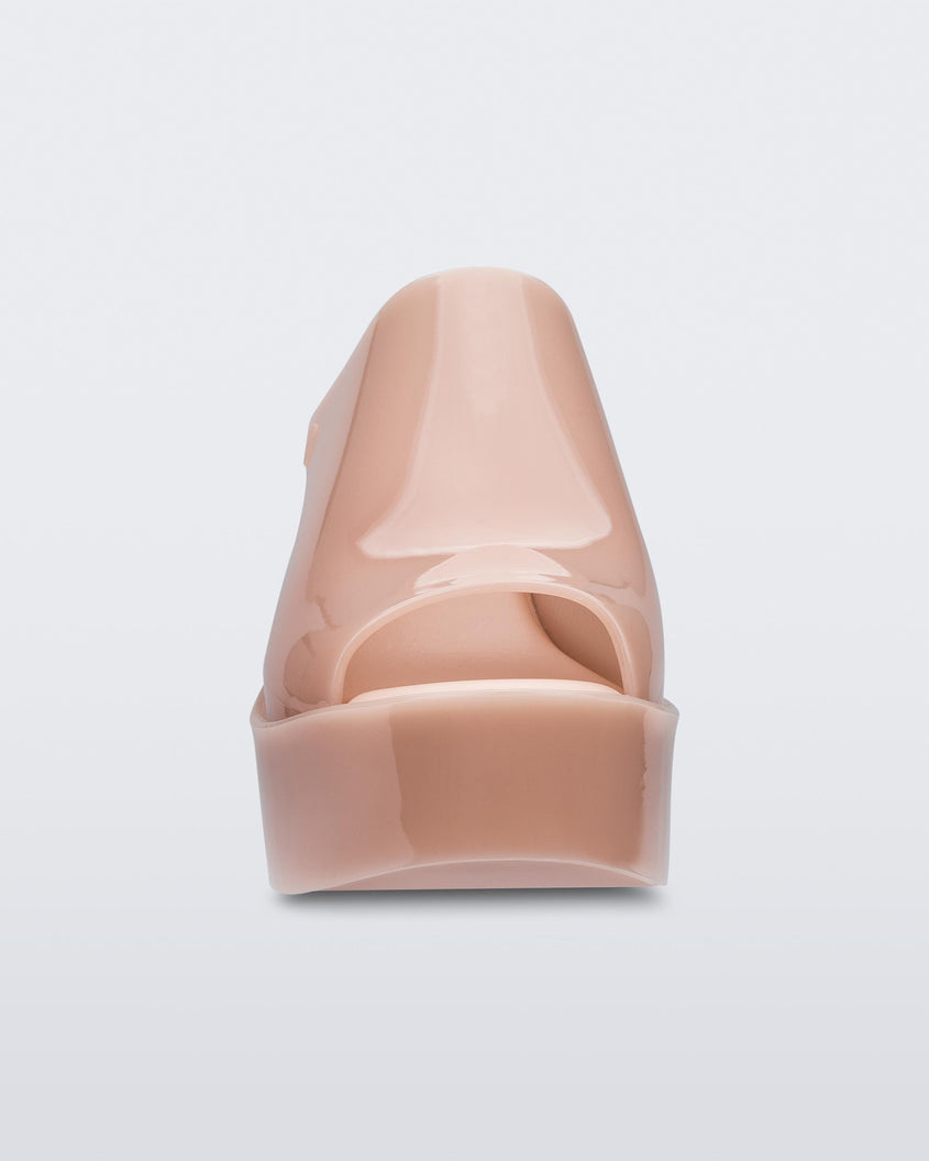 Front view of a pink Melissa Mules platform heel.