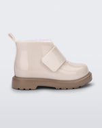 Side view of a beige/brown baby Chelsea boot