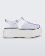 Side view of a Clear/White Melissa Possession Platform sandal with several straps and a closed toe front.