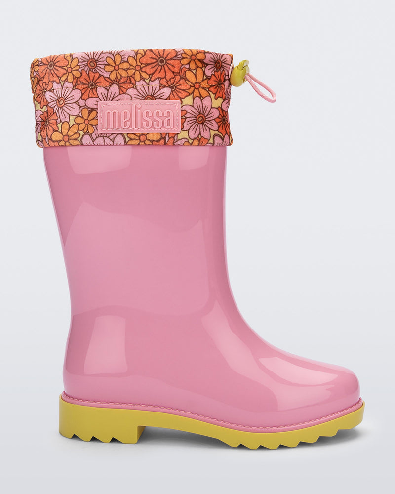 Side view of a pink Rain Boots kids