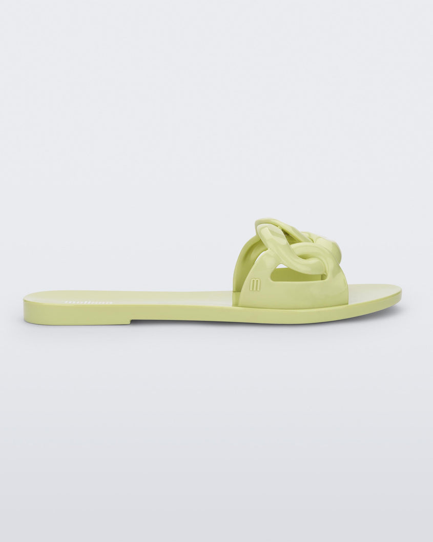 Side view of a green Melissa Jelly Chain slide with a green chain detail.